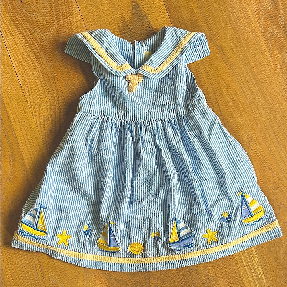 Seersucker striped embroidered dress with sailboats